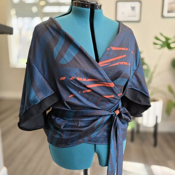 Diarrablu Tops - 💙DIARRABLU Wrap Top with Flutter Sleeves – Size XXL